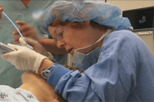 Inserting a bougie to assist with difficult intubation